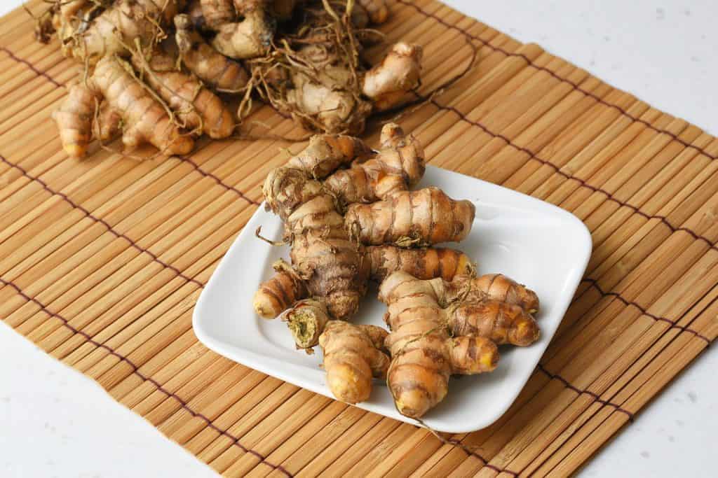 Image de Racine de Ginseng, une Herbe Médicinale Clé en Médecine Traditionnelle Chinoise